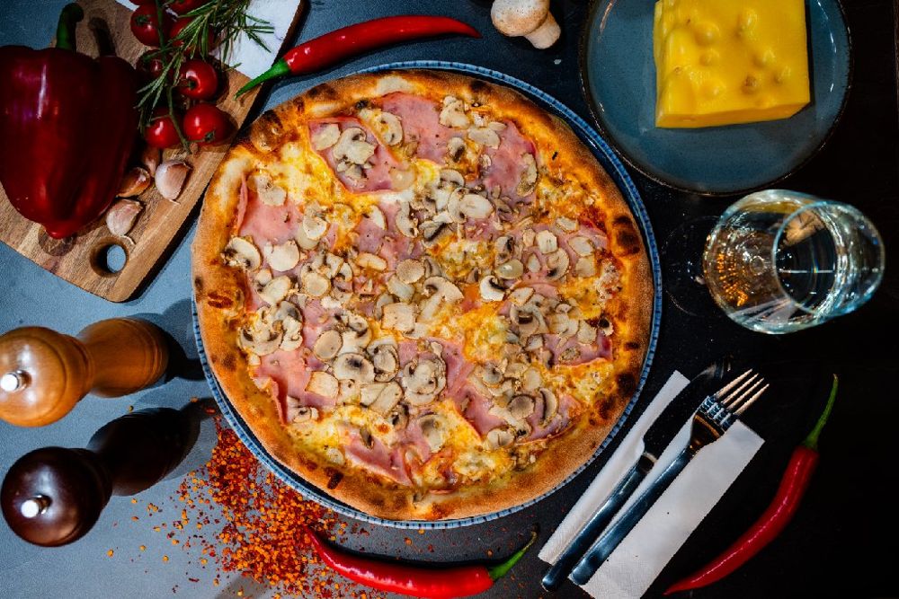 Prosciutto e funghi